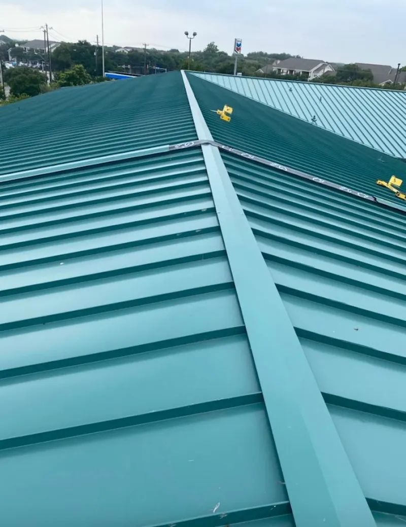 Green commercial metal roof ridge and valley for Metal Roof Repair in Merritt Island